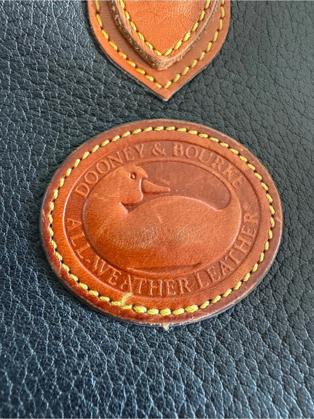 Vintage Dooney & Bourke All-Weather Leather (AWL) Arrowhead Essex Crossbody Bag.